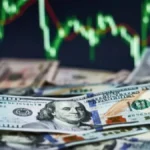Dólar recua após Copom cortar Selic para 14%